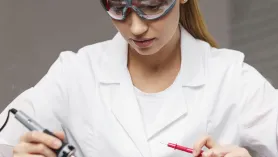 Name female-technician-with-soldering-iron-electronics-motherboard.jpg